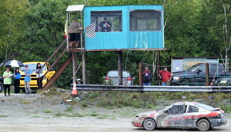 <p>KEVIN MCBAIN PHOTO</p><p>Steven Westhaver gets the checkered flag after winning a heat at the Roughneck Off Road Racing stock car races.</p>