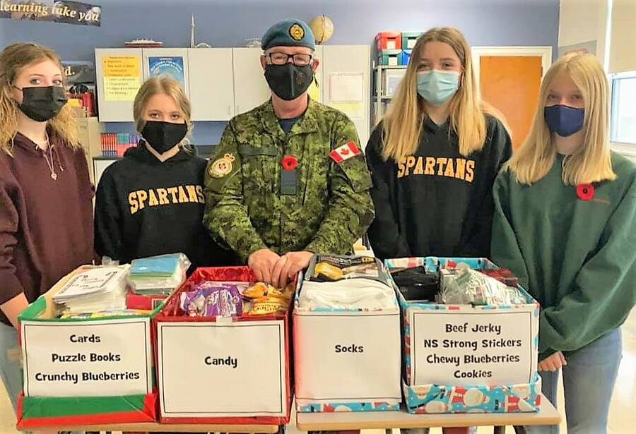 <p>SOURCE/FACEBOOK, NQCS</p><p>Members of the Grade 9 Citizenship class gathered goods from the school and the Caledonia community for the Adopt a Troop program this year. Shown here from left are Sierra Titus, Jayda Atkins, Honourary Colonel and community liaison, Dan Hennessey, Cheyenne Whynot and Miley Huss.</p>