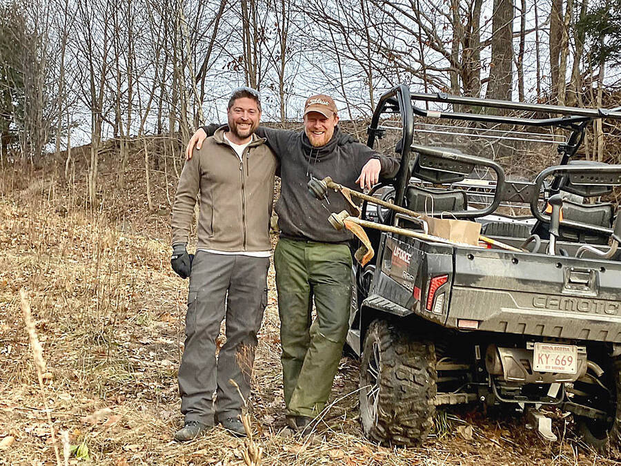 <p>SUBMITTED PHOTO</p><p>Jonathan Lewis (on the right) and his friend Andy Reid working on the public hiking trail they recently helped create in Hebbville.</p>
