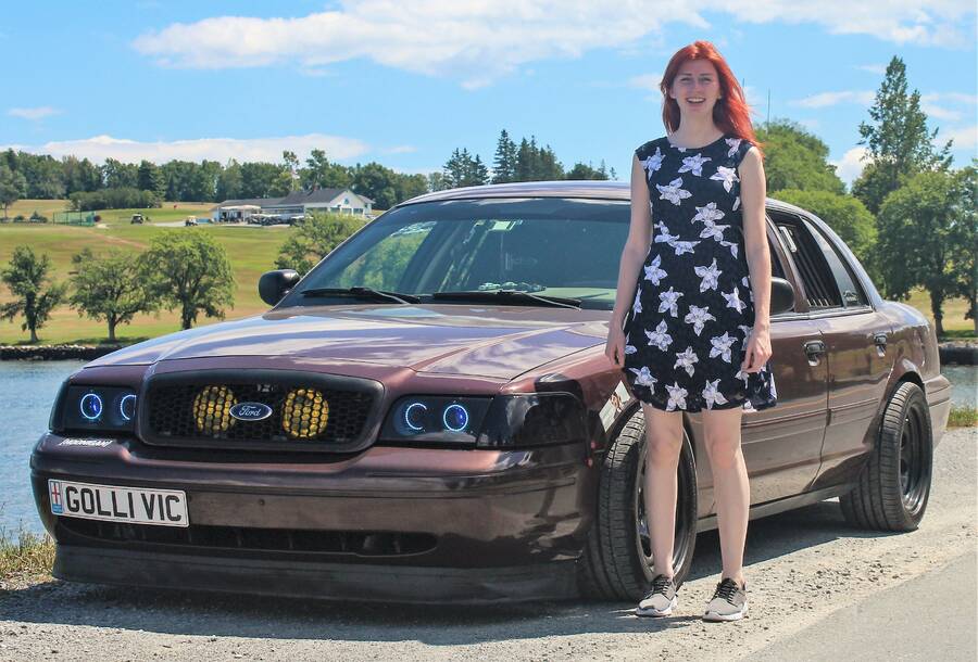 <p>Lauren Sharatt decided to start a bi-weekly car meet in Lunenburg last year and it grew in popularity throughout the summer. She hopes that the more and more people will come out and share their passions with others. Sharatt is shown here with her project, a 2011 Ford Crown Victoria P7B.</p><p>CONTRIBUTED PHOTO</p>