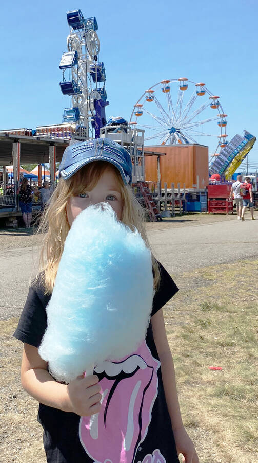 <p>Young Veronica Baker, 6, of Digby is enjoying her cotton candy.</p>