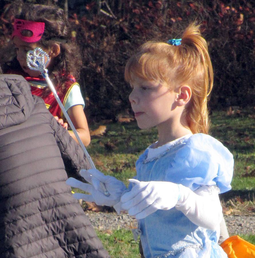 <p>Costumes galore at trunk-or-treat.</p>