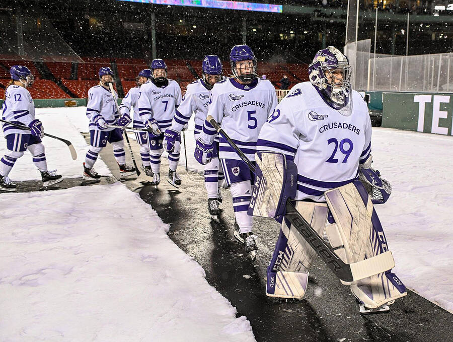 <p>CONTRIBUTED PHOTO</p><p>Lunenburg&#8217;s Madison Beck (29) leads her Holy Cross Crusaders out to the ice at Fenway Park Jan. 6.</p>