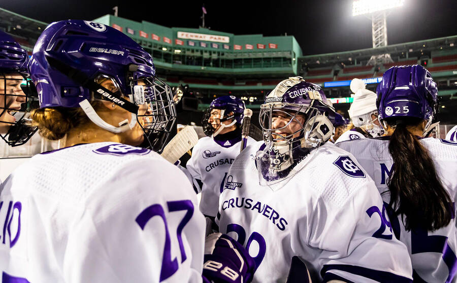 <p>CONTRIBUTED PHOTO</p><p>Madison Beck of Lunenburg and her Holy Cross team-mates celebrate after a 3-2 win over rival Boston University at Fenway Park Jan. 6.</p>