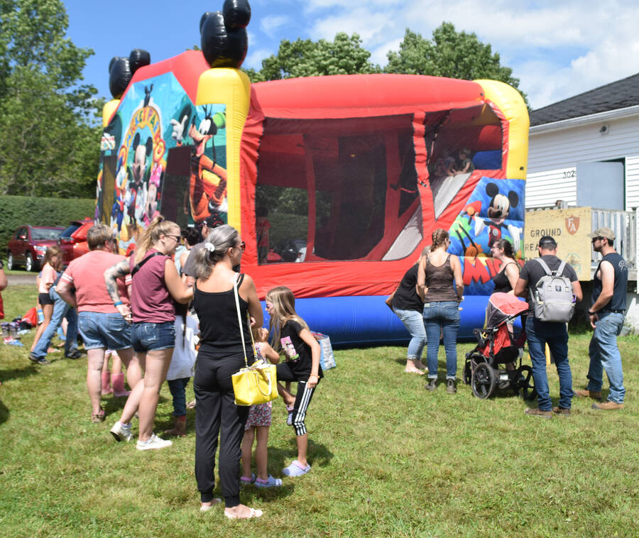 <p>A bouncy castle provided hours of entertainment.</p>
