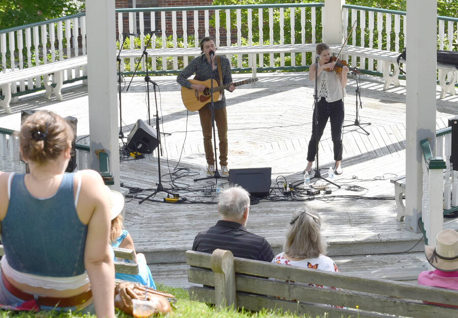<p>The duo, Youngtree &amp; Carole Bee entertain the crowd at the Lunenburg Bandstand stage.</p>
