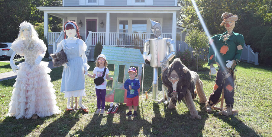 <p>FILE PHOTO</p><p>Claire, 5, and Rowan, 2, Westhaver of Mahone Bay get their photos taken with some of the cast members of the Wizard of Oz at last year&#8217;s Scarecrow Festival and Antiques Fair.</p>