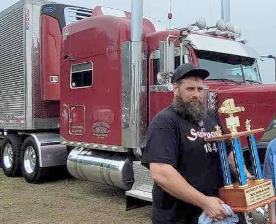 <p>SOURCE: TYLER MEISNER</p><p>Dean LeBlanc of New Brunswick wins a prize at the show and shine in Bridgewater.</p>